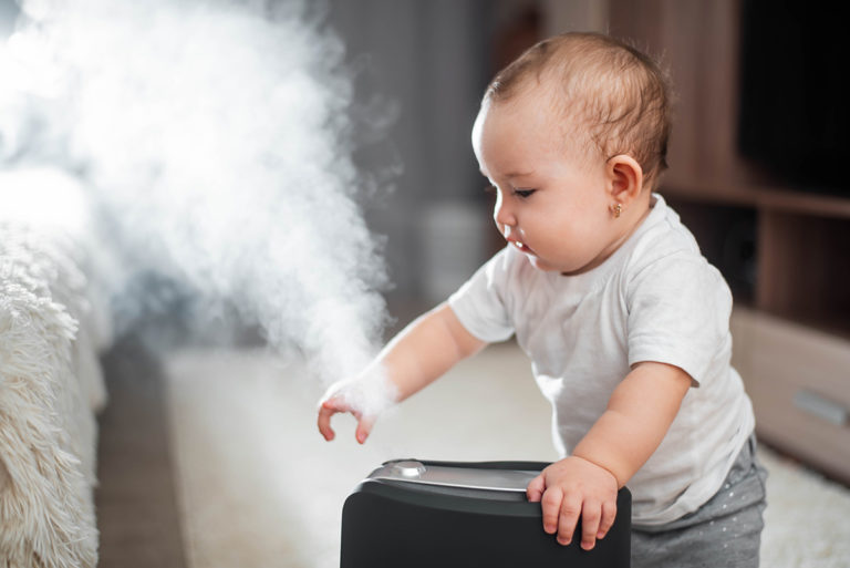 kid with humidifier